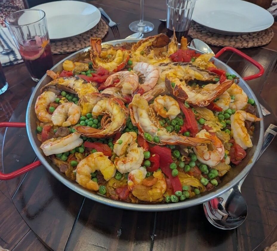 Spanish seafood paella with shrimp and mussels in a paella pan